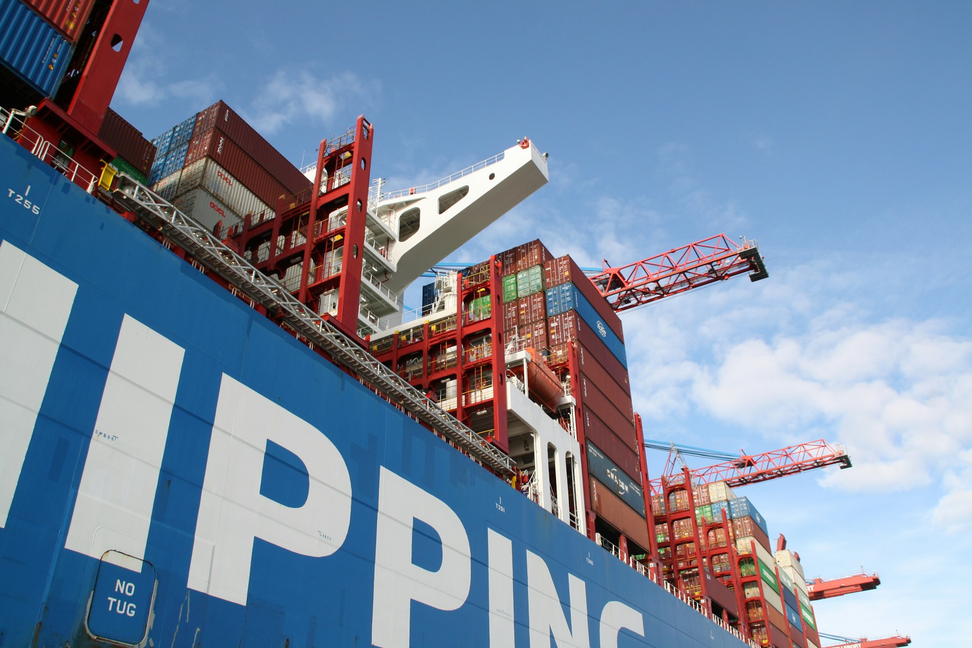 Container cargo ship at port — global trade and supply chain