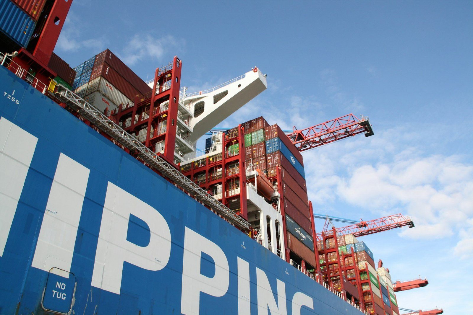 Container cargo ship at port — global trade and supply chain