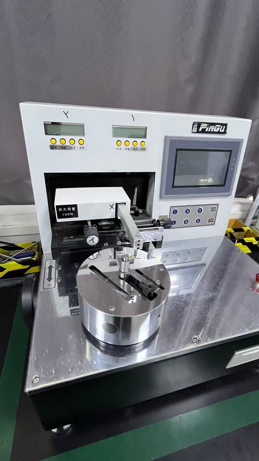 Torsion testing machine checking power spring torque at AOFENG SPRING Thailand